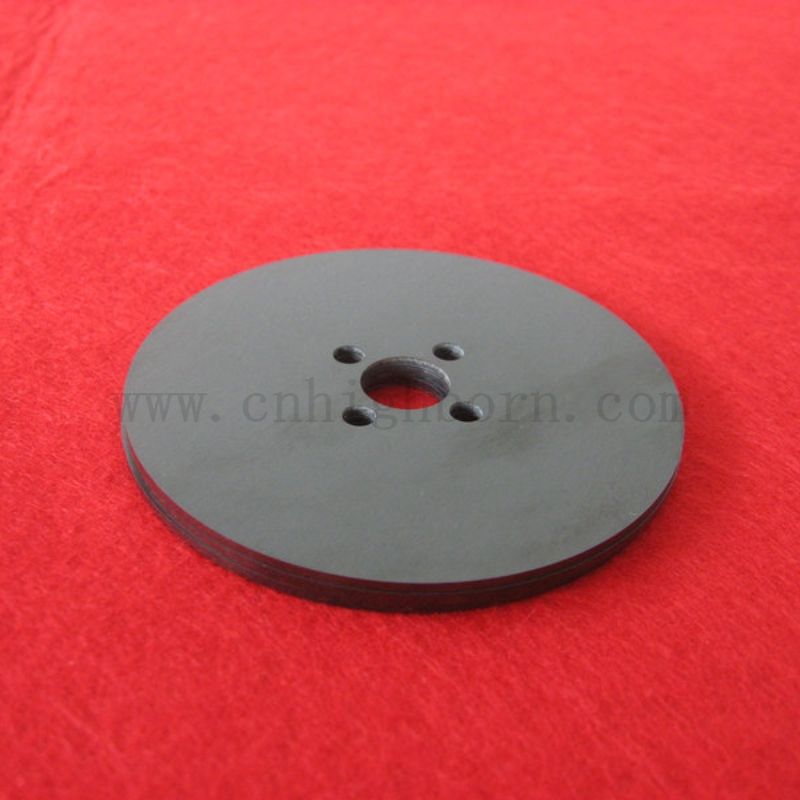 Piastra rotonda di zirconia nera perforata laser