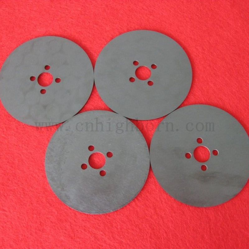 Piastra rotonda di zirconia nera perforata laser