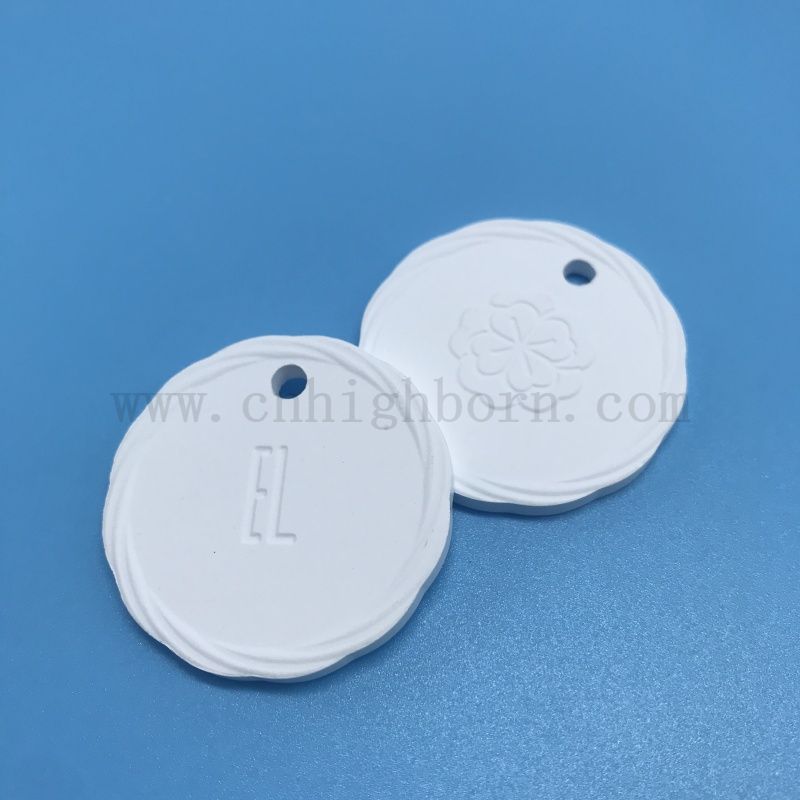 Piatto da appendere con diffusore di aromi in pietra profumata in ceramica porosa con logo su doppio lato